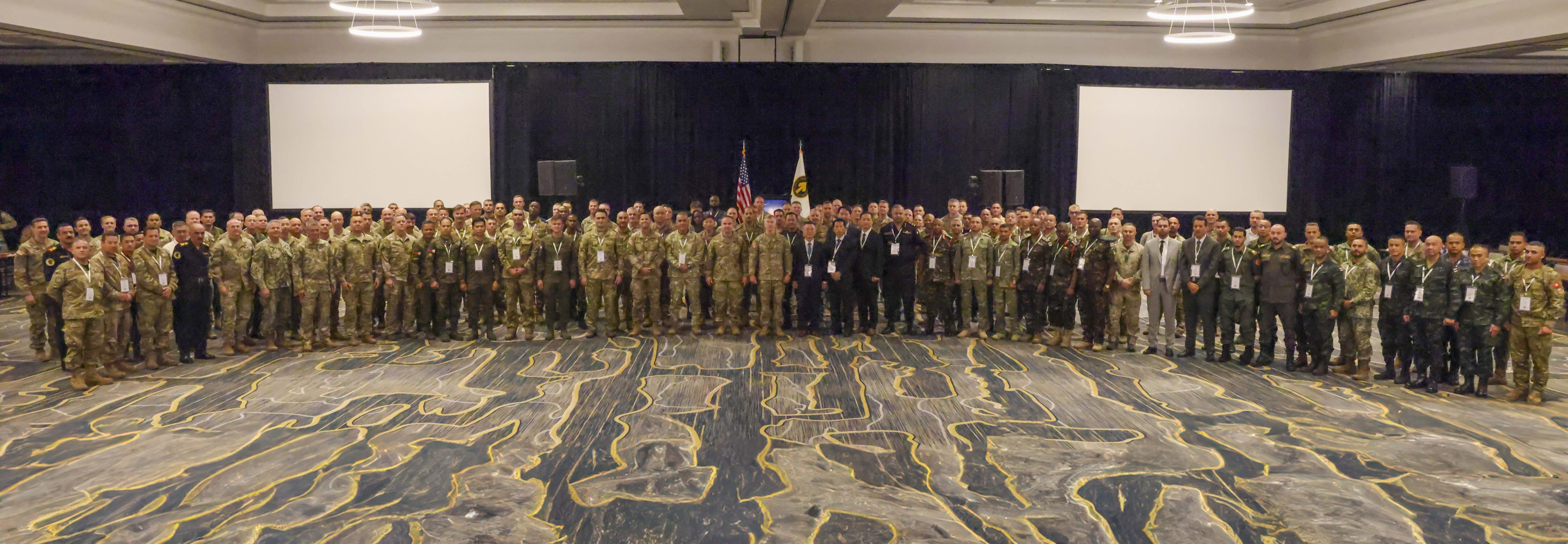 A wide shot of a group of participants representing 61 countries.