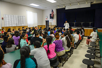 Retired Lt. Cmdr. Evangelo Morris had what some may consider a challenging task: teach 100 elementary school students the signif