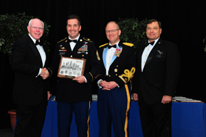 Sgt. Maj. Kent Dolasky (2nd from left) receives the Greater Tampa Chamber of Commerce Army Service Member of the Year award Feb.