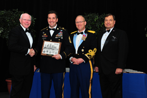 Sgt. Maj. Kent Dolasky (2nd from left) receives the Greater Tampa Chamber of Commerce Army Service Member of the Year award Feb.