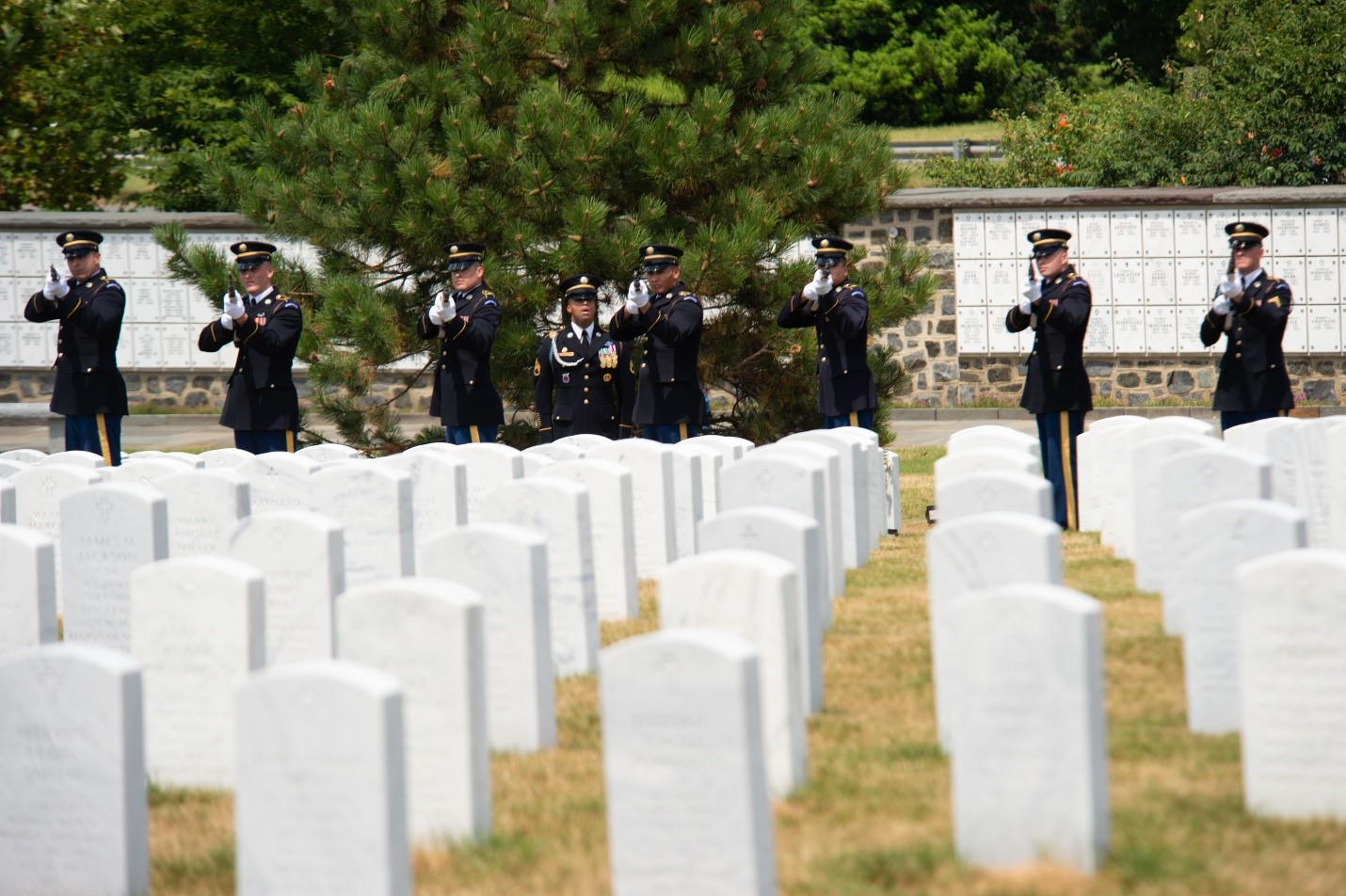 Soldiers of the 3rd Infantry Regiment (The Old Guard) render a three-volley salute during the graveside service for a special op